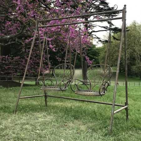 Schaukelstuhl Fauteuil à bascule aus Eisen und patinierter grauer Gusseisen-Optik für den Außenbereich, Seitenansicht