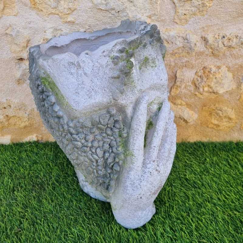 Antiker Topf im Gesicht-Design mit gealterter Optik