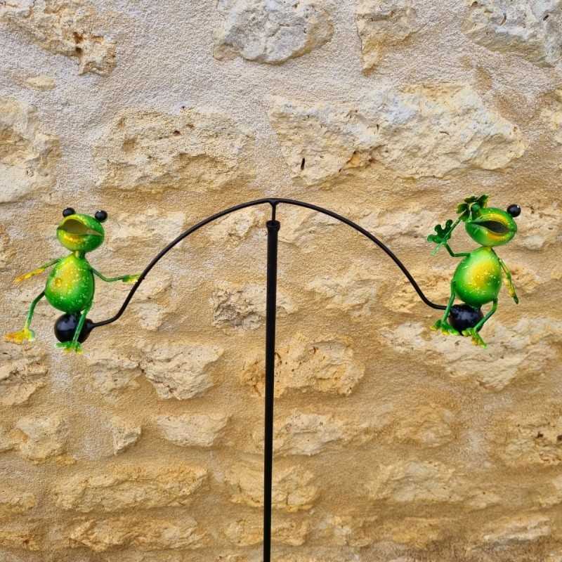 Eisen-Balancier mit buntem Froschmotiv
