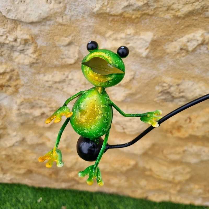 Eisen-Balancier mit buntem Froschmotiv