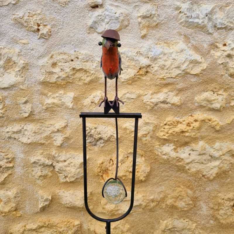 Balancier, Metallstab und Vogel aus Glas mit Hut
