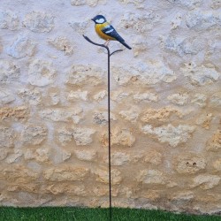 Dekorativer Vogel auf gelbem Spieß
