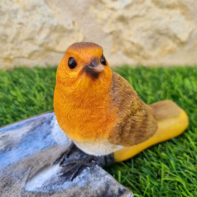 Vogeltränke und Futterstelle aus Harz in Form einer Schaufel