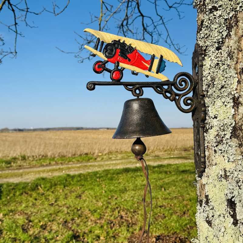 Flugzeug-Türglocke aus Gusseisen mit rot-gelbem Doppeldecker