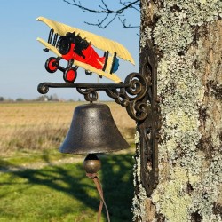 Seitliche Ansicht der Türglocke mit Doppeldecker aus Gusseisen
