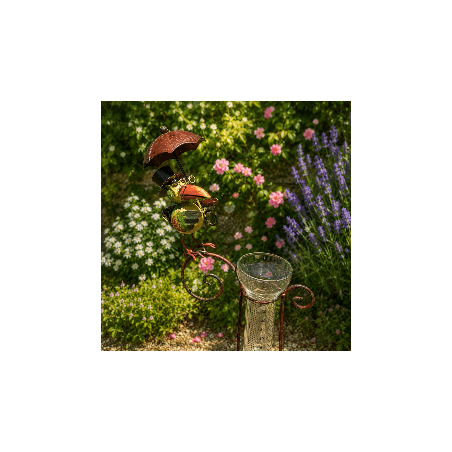 Dekorativer Regenmesser mit Vogel im Blumenbeet